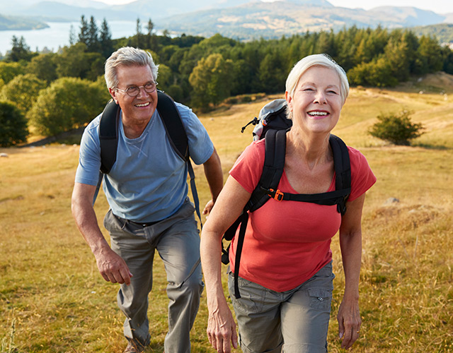 Colorado cataract surgery patient hiking in sun with husband