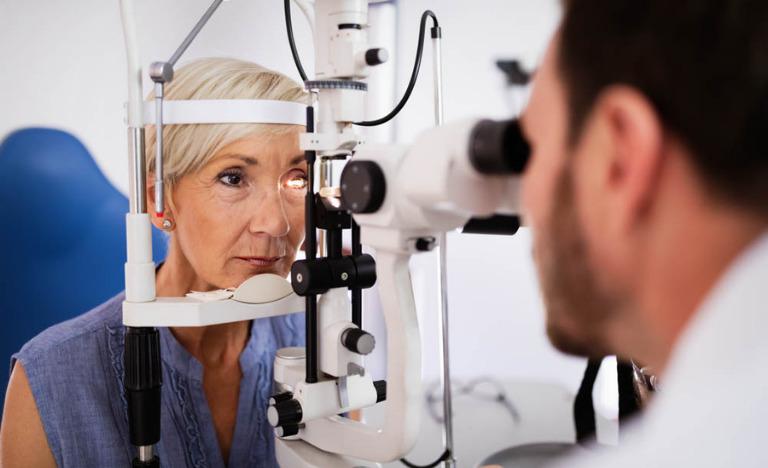 Women getting her eyes checked by male ophthalmologist