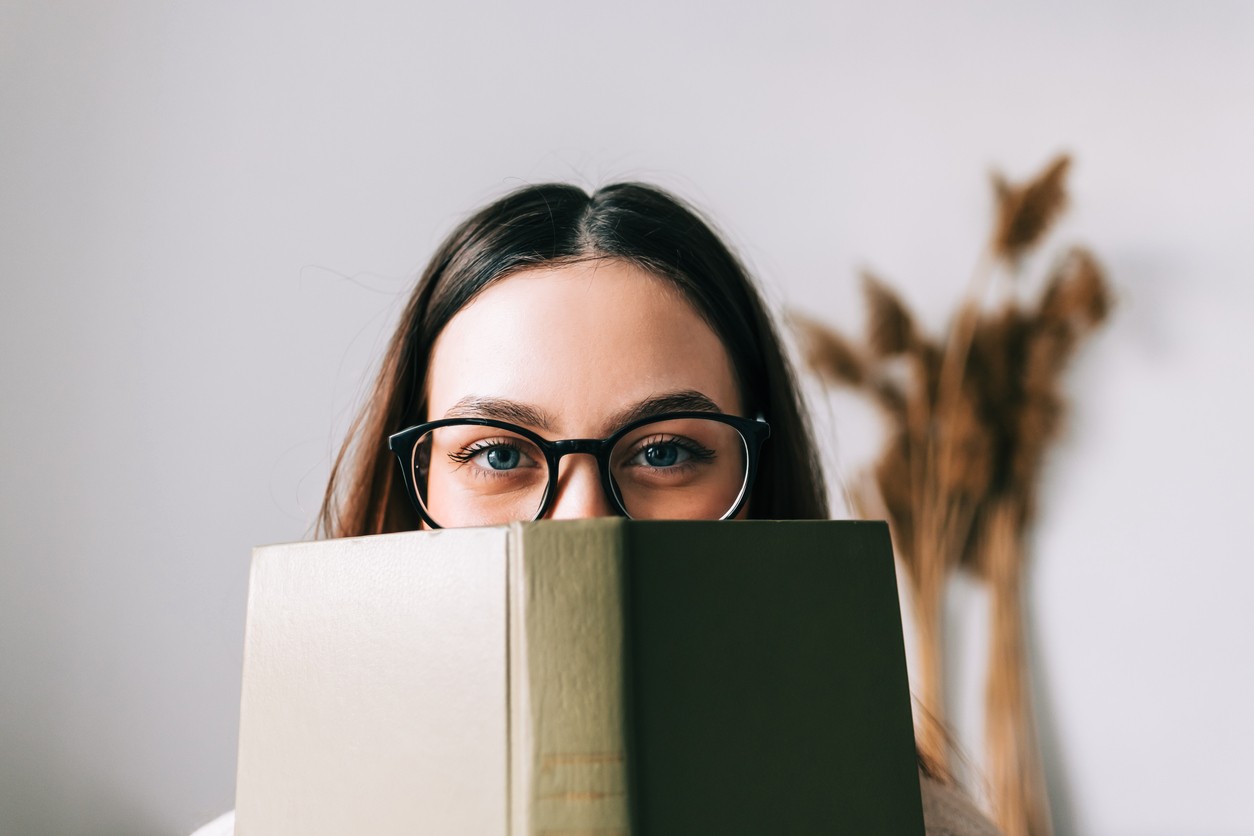 woman-in-glasses-reading-book