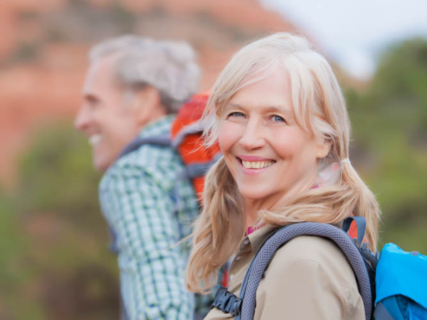 older couple enjoying hiking after cataract surgery in Moab Utah